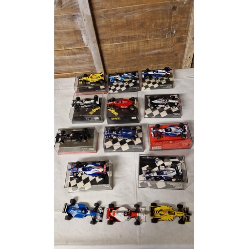 878 - 11 X MINICHAMPS MODEL F1 CARS BOXED & 3 X UNBOXED.