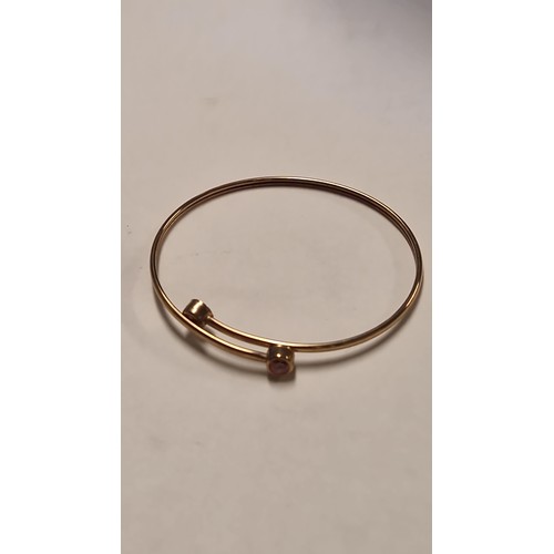 70 - BEAUTIFUL 9CT GOLD BANGLE SET STONES