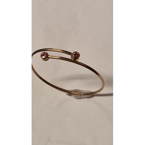 70 - BEAUTIFUL 9CT GOLD BANGLE SET STONES