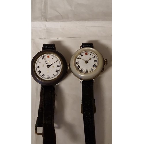 104 - TWO VINTAGE 'RED 12' WATCHES - 1 X WATCH IS MISSING THE GLASS TO FRONT - CLOCKS AND WATCHES ARE NOT ... 