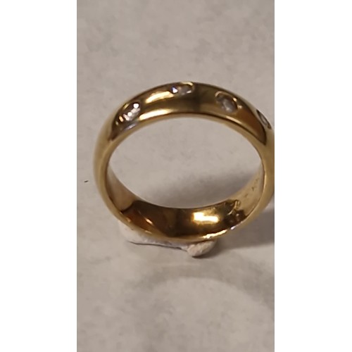 130 - PRETTY SILVER & GILT DIAMONIQUE RING - RING SIZE K 1/2