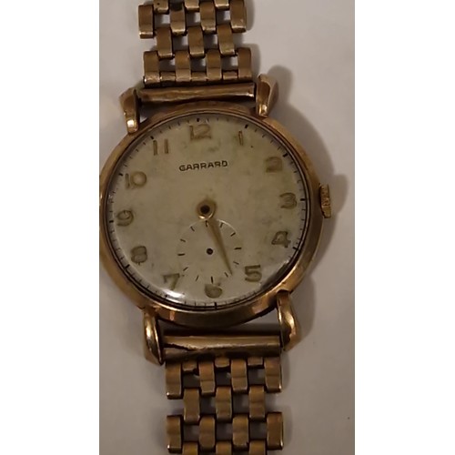 180 - LOVELY VINTAGE GARRARD GENTS 9CT GOLD WATCH WITH A 9CT GOLD BRACELET STRAP - THE STRAP IS BROKEN AND... 