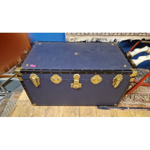 762 - LARGE BLUE TRAVEL TRUNK - 94CMS X 50CMS X 50CMS