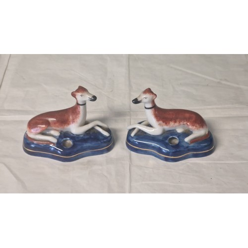 262 - PAIR OF SMALL STAFFORDSHIRE DOGS AS DESK PEN HOLDERS - 10CMS X 7CMS H