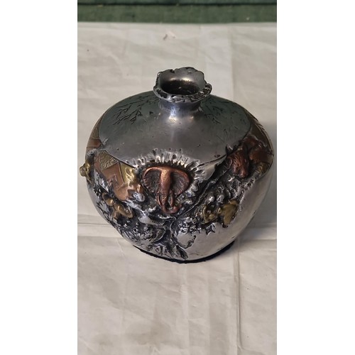 265 - UNUSUAL AFRICAN ART METAL BULBOUS VASE - STANDS 10CMS H