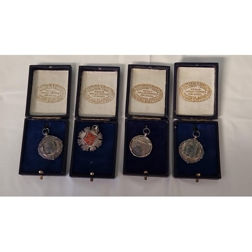 280 - 4 X BOXED SILVER MEDALIONS