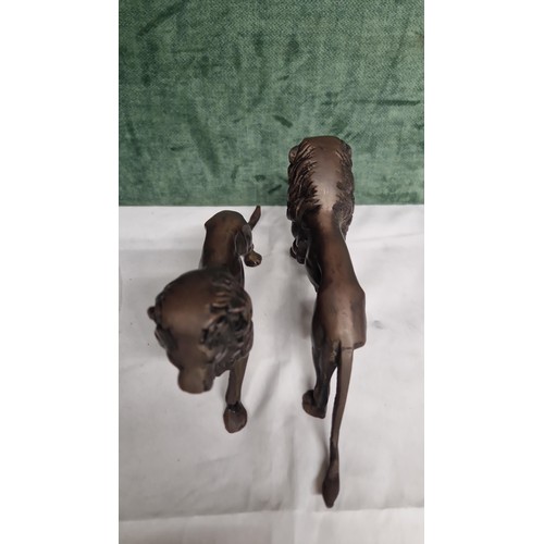 94 - PAIR OF HEAVY BRONZE VINTAGE LIONS - 18CMS X 11CMS H