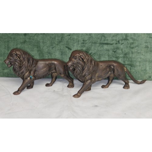 94 - PAIR OF HEAVY BRONZE VINTAGE LIONS - 18CMS X 11CMS H