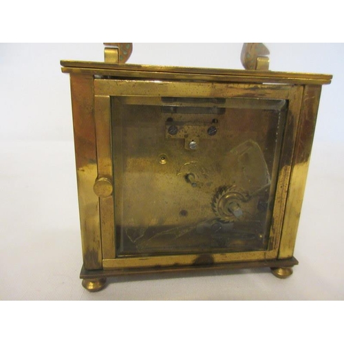 103 - Antique brass and cloisonne carriage clock with key.