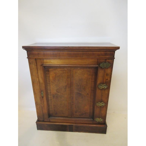 133 - A good 19th century inlaid walnut side cabinet, the single door having decorative brass hinges and r... 