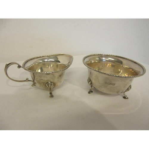 142 - English silver sugar bowl and cream jug with rope twist rim. Chester 1917, 7 troy ozs.