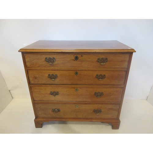 185 - Georgian mahogany chest of four graduated drawers raised on bracket feet. W. 37