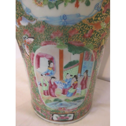 217 - A 19th century Chinese cantonese vase decorated with large panels of figures and lesser panels of fl... 