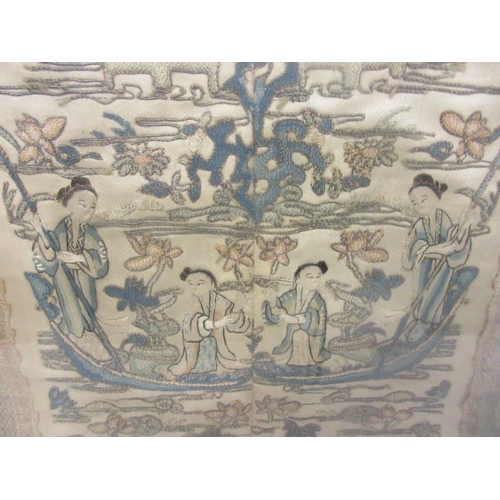 218 - A Chinese silk on silk embroidered panel. Depicting figures boating on a loftus pond. A fine quality... 