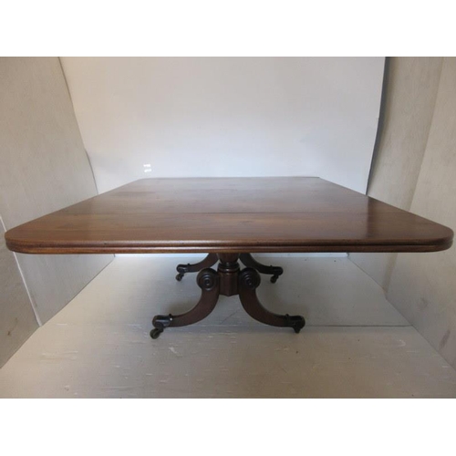 72 - A fine early 19th century (Cork) mahogany dining table, the rectangular top raised on twin column su... 