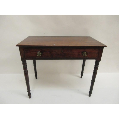 102 - Georgian mahogany side table fitted with a drawer and raised on ring turned legs. Width 3ft, Depth 1... 