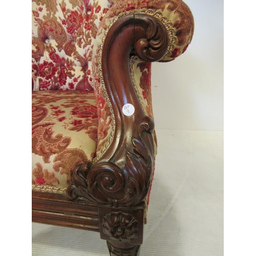 119 - A good Victorian carved mahogany drawing room chair raised on turned legs. (Probably Irish) Circa 18... 