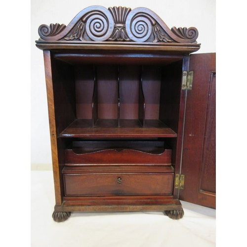 125 - A good antique (Cork) mahogany table top cabinet with fitted interior and raised on turned feet. H. ... 