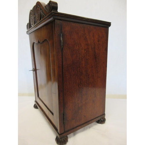 125 - A good antique (Cork) mahogany table top cabinet with fitted interior and raised on turned feet. H. ... 