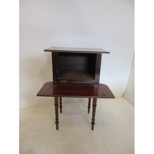 130 - Neat size antique mahogany lamp table with storage cupboard.