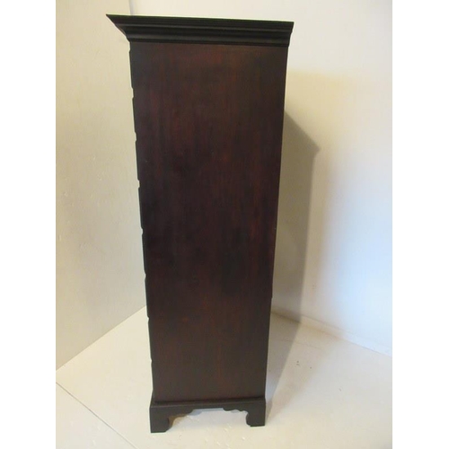 132 - A Georgian mahogany tall boy chest of 8 graduated drawers having brass handles and key plates and ra... 