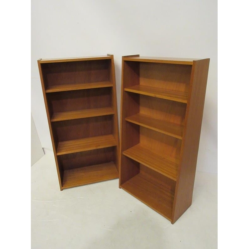 134 - A pair of teak bookshelves. H. 47