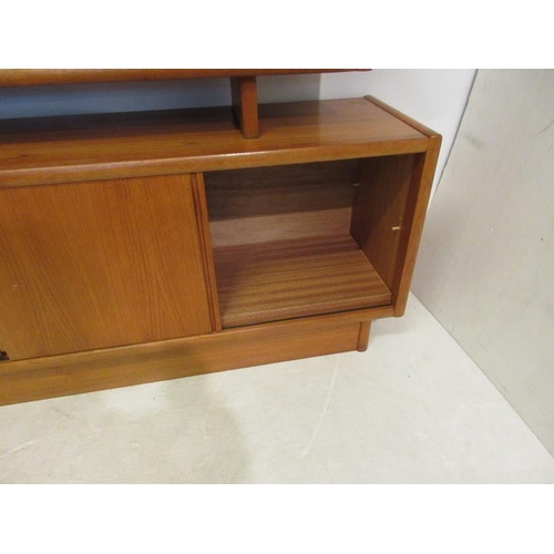 135 - A fine teak dining room cabinet, circa 1960. W. 72