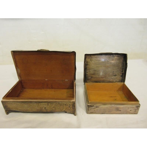 167 - Two English silver cigarette boxes.