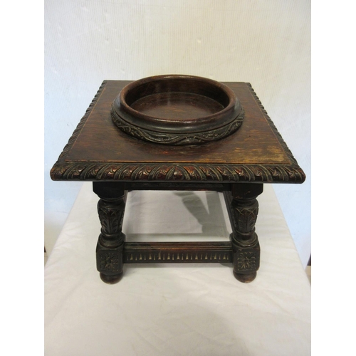 199 - Good antique Chinese bronze two handled jardinere on carved oak base.