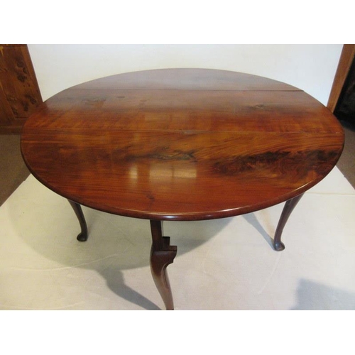 227 - A fine Irish Georgian mahogany drop leaf table raised on six legs with faceted pad feet. Width fully... 