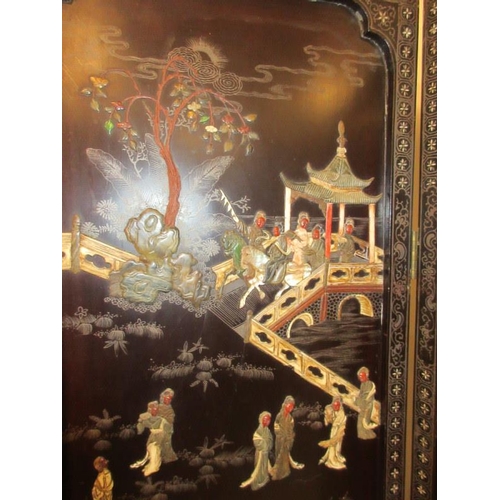 229 - A Chinese four panel back lacquer screen inlaid with mother of pearl and soapstone depicting court a... 