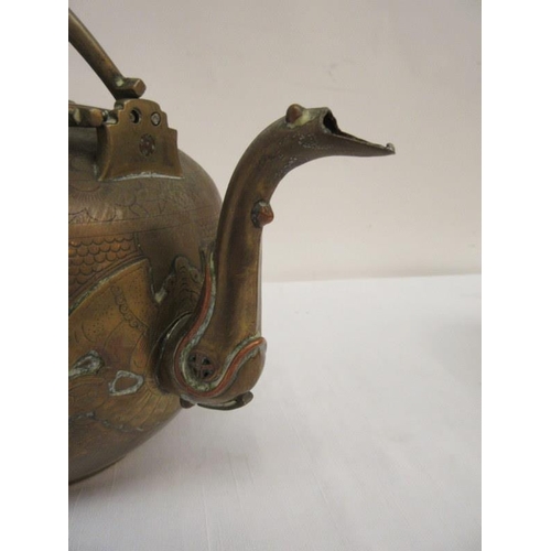 230 - Chinese brass and copper tea pot with double handle, engraved with flowers, orchids and people.