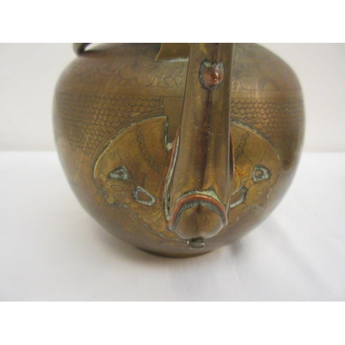 230 - Chinese brass and copper tea pot with double handle, engraved with flowers, orchids and people.