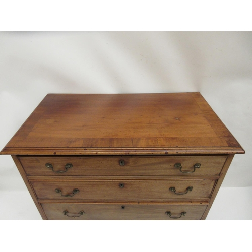 234 - A neat size Georgian mahogany chest having four graduated drawers and raised on bracket feet. W. 34