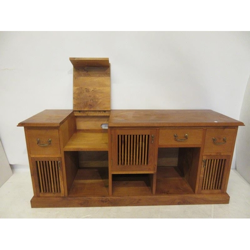 255 - An elm and oak music cabinet matching the previous lot. W. 58