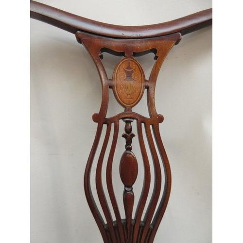 267 - A pair of Edwardian mahogany and satinwood inlaid side chairs.