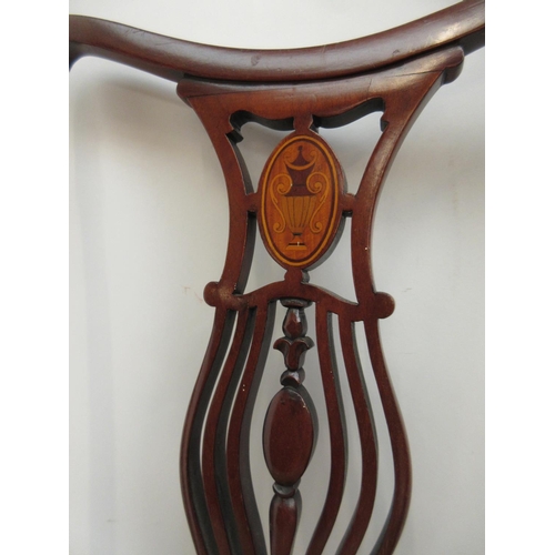 267 - A pair of Edwardian mahogany and satinwood inlaid side chairs.