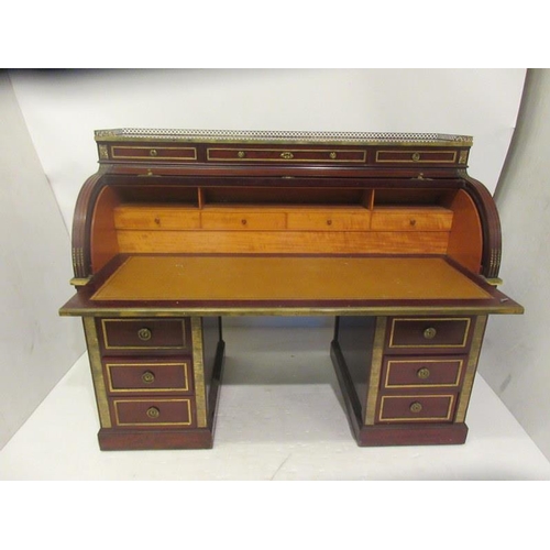 280 - A fine 19th century French mahogany and brass mounted cyclinder desk fitted with 12 drawers and havi... 