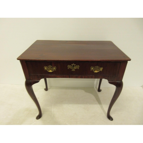 296 - Antique mahogany silver or side table fitted with a drawer and raised on cabriole legs. W. 31