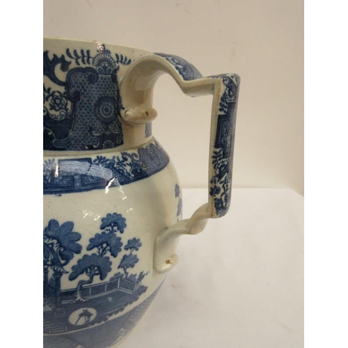 66 - An old blue and white tureen and cover and a large jug. (2)