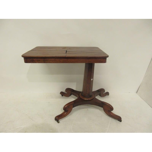 72 - A Victorian mahogany reading bedside table raised on centre column and four splay feet. (adjustable)... 