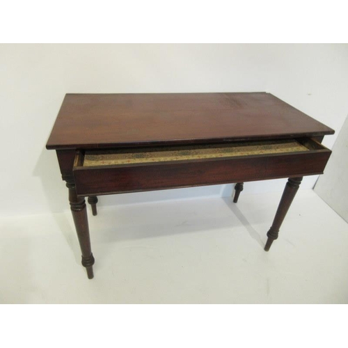30 - A mid 19th century mahogany side table fitted with a drawer and raised on turned legs. W. 107cm, D. ... 