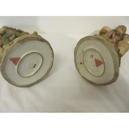 41 - A pair of 19th century Royal Dux figures of water carriers. H. 50cm approx. Overall condition is goo... 