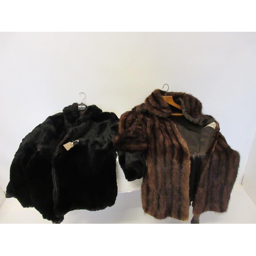 52 - Two ladies fur coats. 
Damage to the brown fur coat. (see photos)