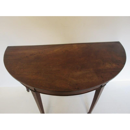 68 - Georgian mahogany demi lune side table raised on tapered legs ending with spade feet. Width 126cm De... 