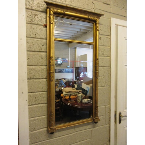 74 - A Regency gilt framed pier mirror. Height 99cm, width 53cm approx.