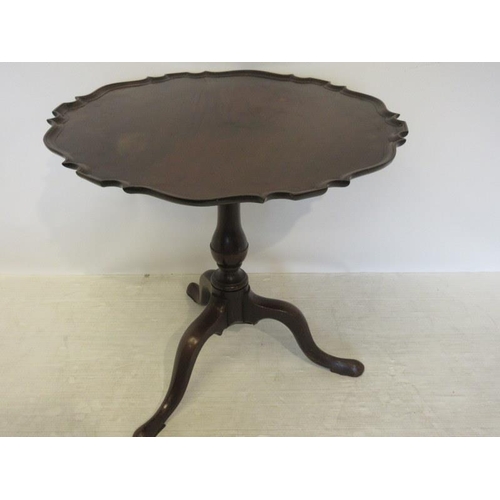 105 - Georgian mahogany wine/tea table having pie crust border, turned column & tripod base.