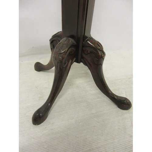 109 - Georgian mahogany coat stand, the turned column raised on pod base.