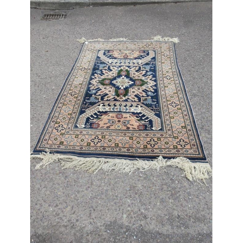 113 - Persian style rug. 200cm x 120cm approx.