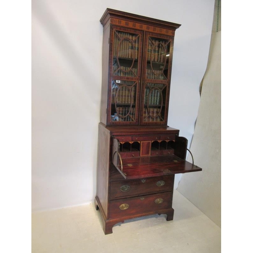 133 - A fine Irish Georgian mahogany secretaire bookcase, the upper section having inlaid cornice with den... 